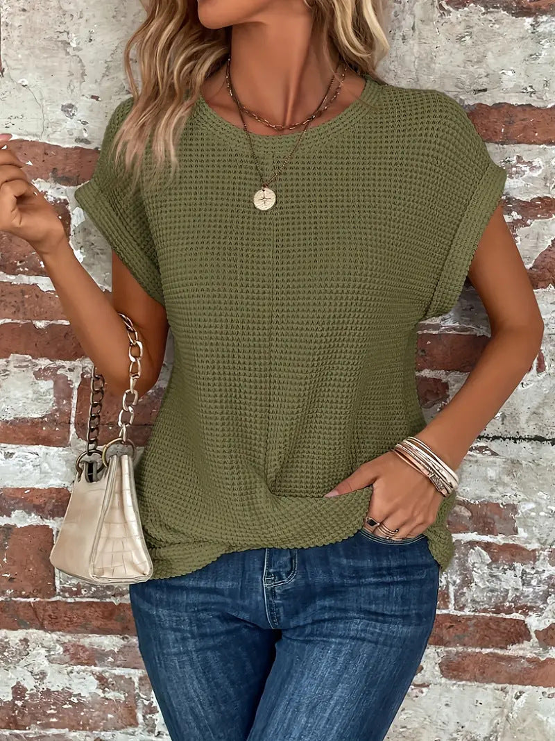 Women's waffle knit casual tee with rolled sleeves and front twist detail in relaxed fit