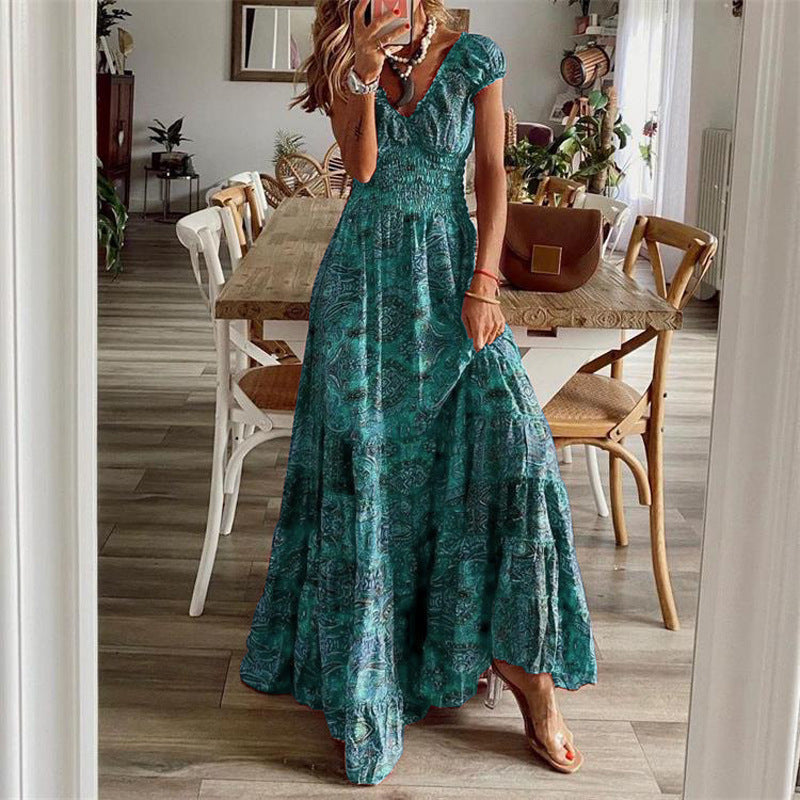 Floral cotton maxi dress with V-neck, smocked bodice, and flowing tiered skirt for women