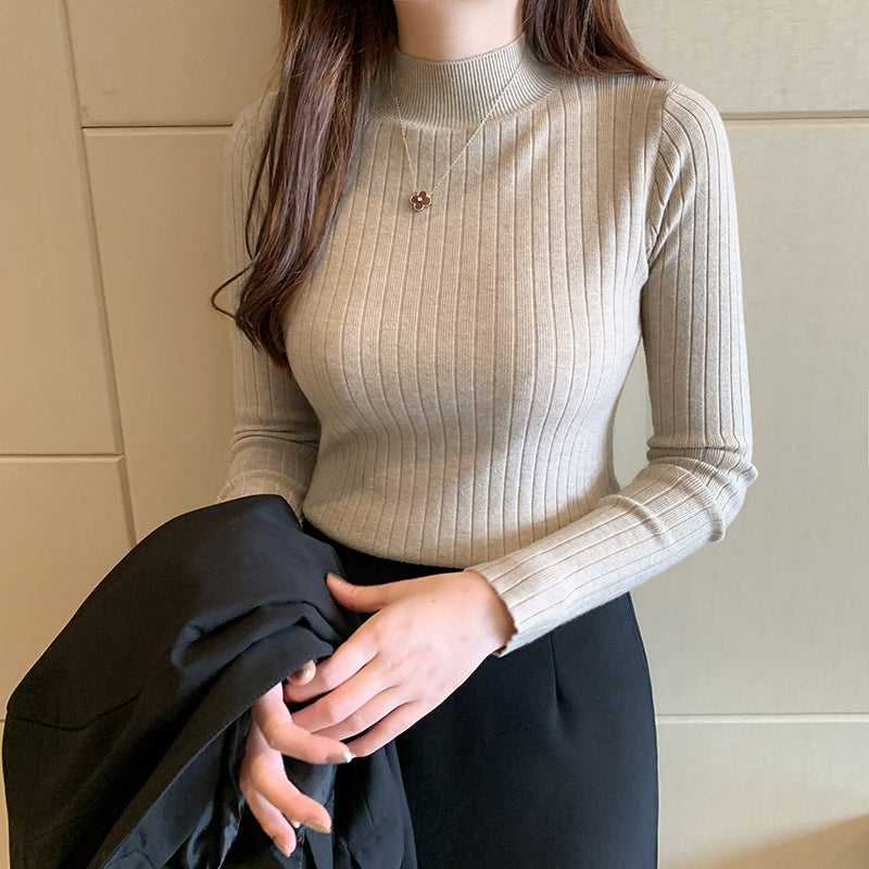 Ivory ribbed turtleneck fitted knit top with cozy fold-over collar for fall layering