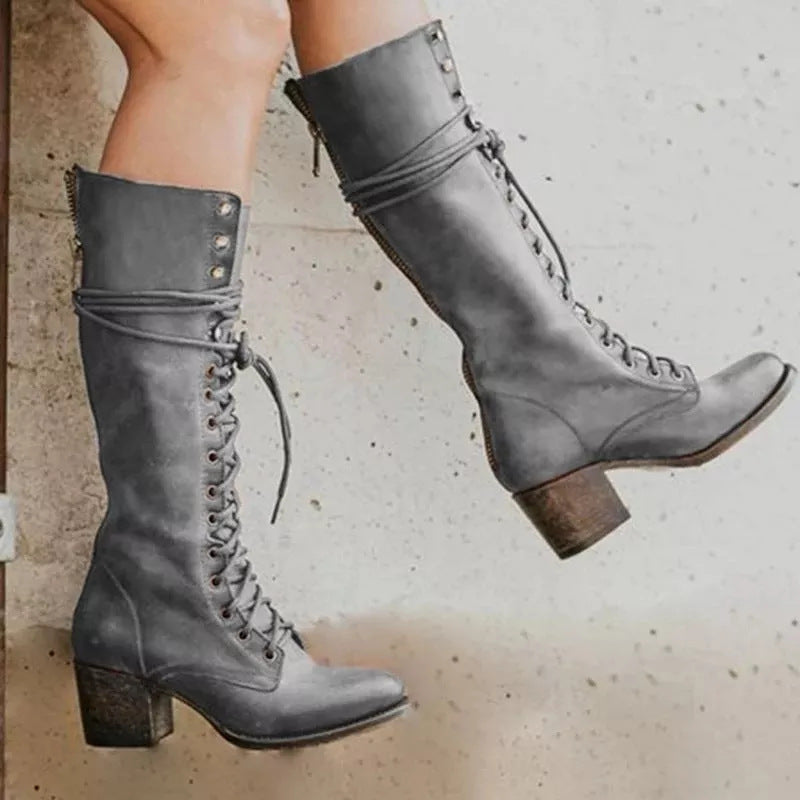 Women's vintage lace-up high heel boots with tall shaft and rugged detailing for autumn styling