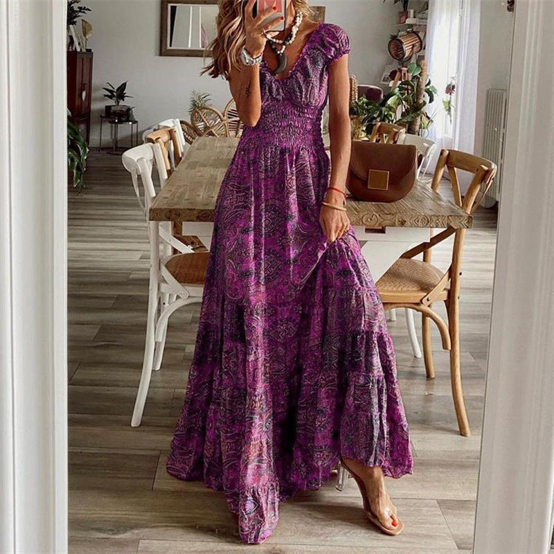 Floral cotton maxi dress with V-neck, smocked bodice, and flowing tiered skirt for women