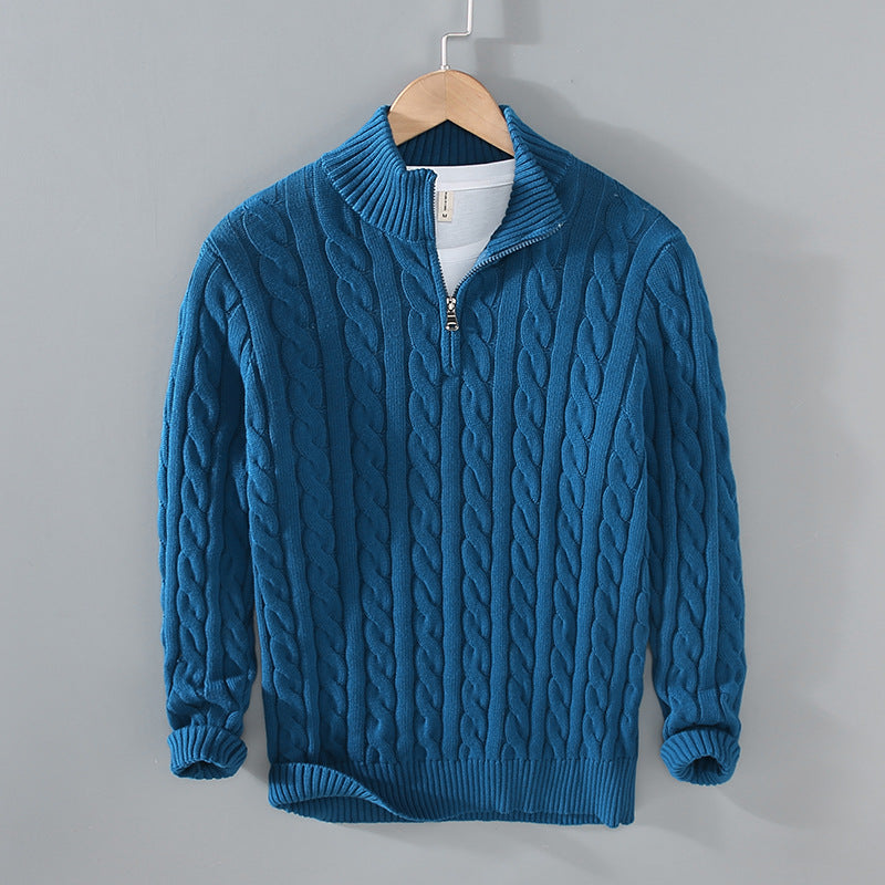Men's black half-zip cable knit pullover sweater with classic textured pattern and ribbed collar