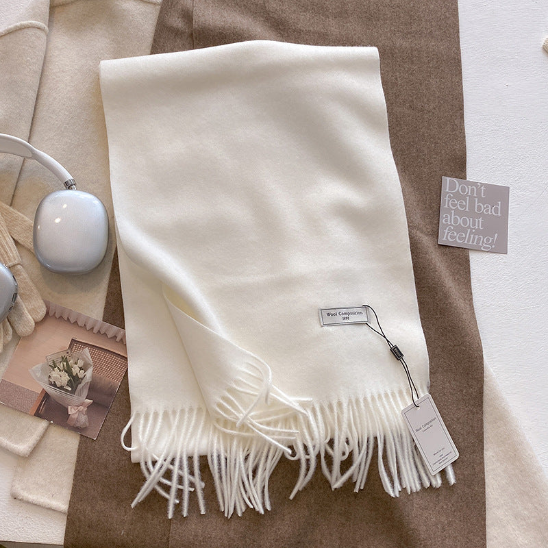 Soft plain tassel scarf shawl wrap in neutral tone, versatile cozy layering piece for women