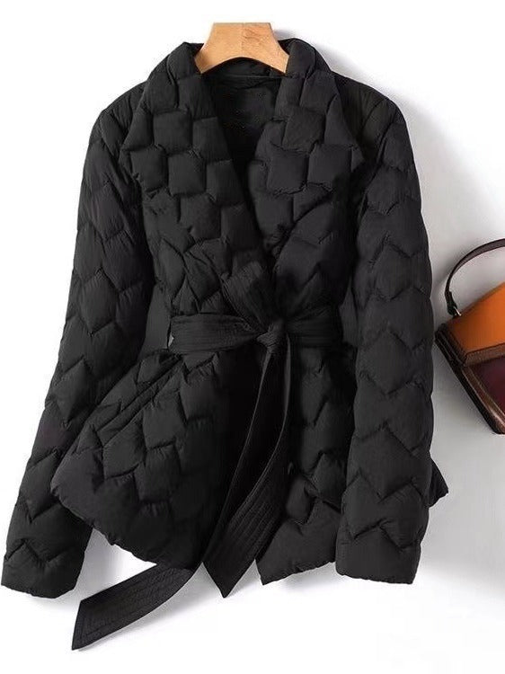 Women's black quilted jacket tailored fit with tie belt, hip-length cut and notched collar