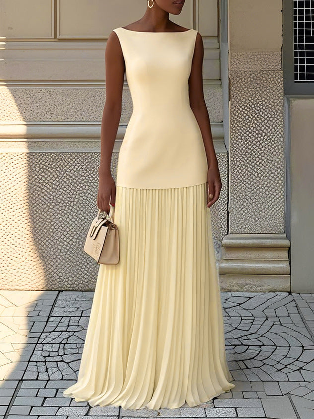 Sleeveless pleated maxi dress with figure-enhancing bodice and flowing skirt for elegant occasions