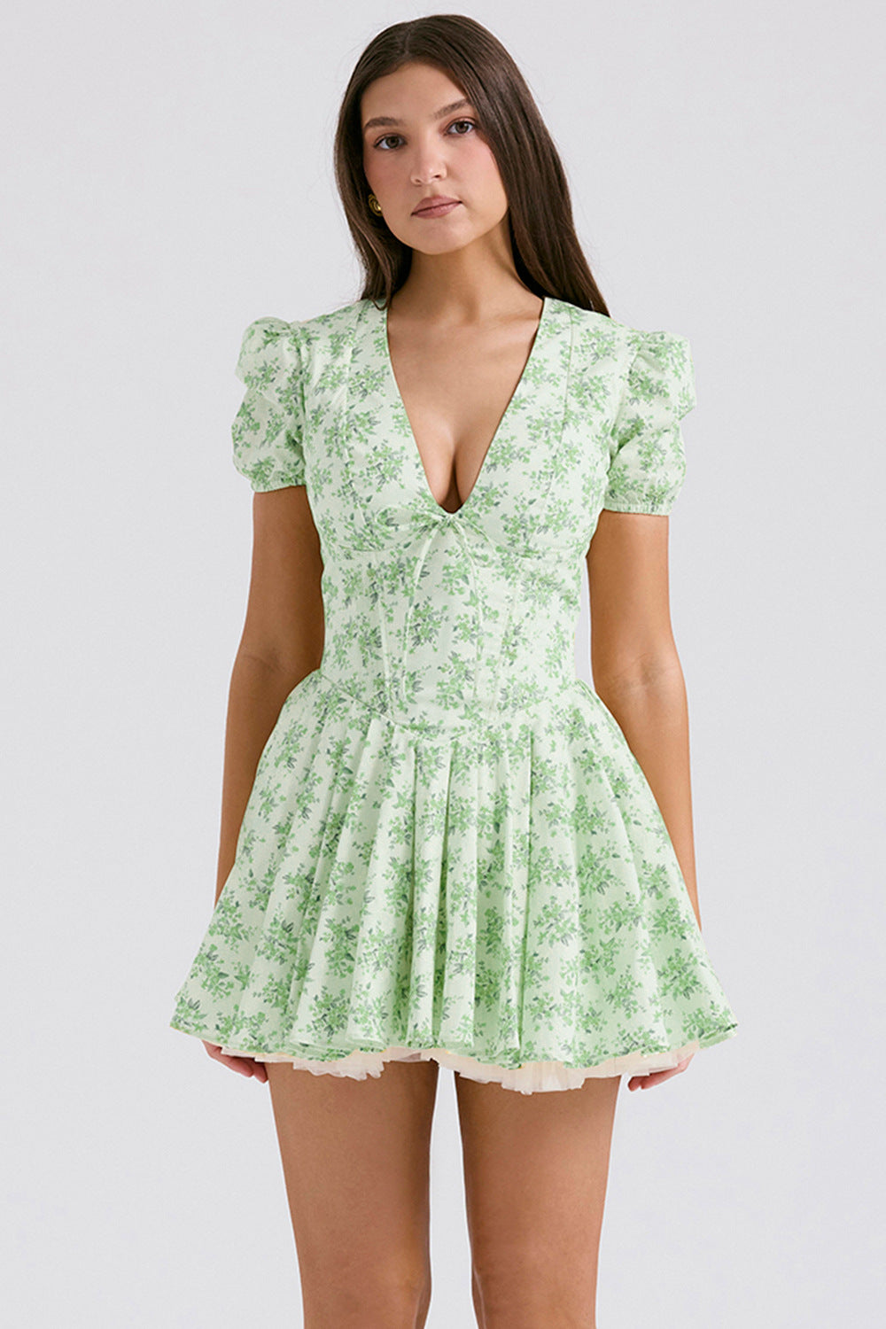 Floral print mini dress fitted A-line silhouette deep V-neck puff sleeves warm-weather feminine style