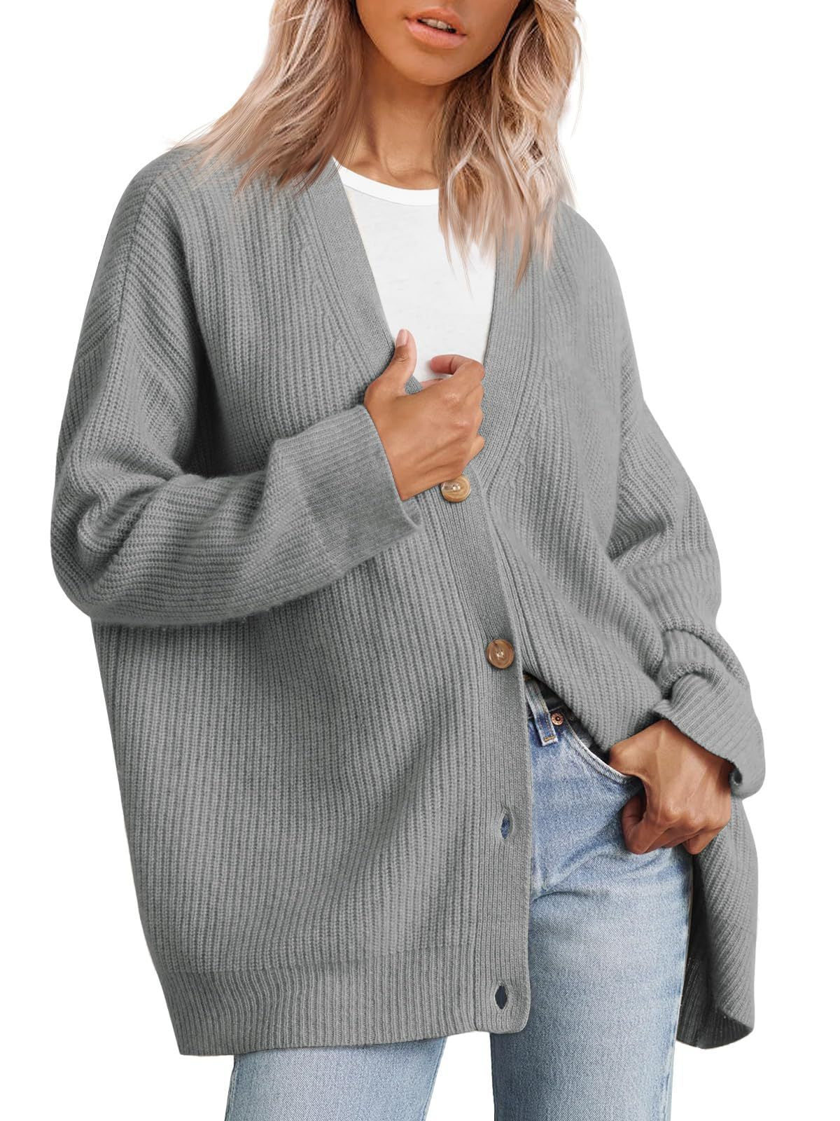 Oversized striped knit cardigan with V-neckline and classic button-down front in cozy fall layers