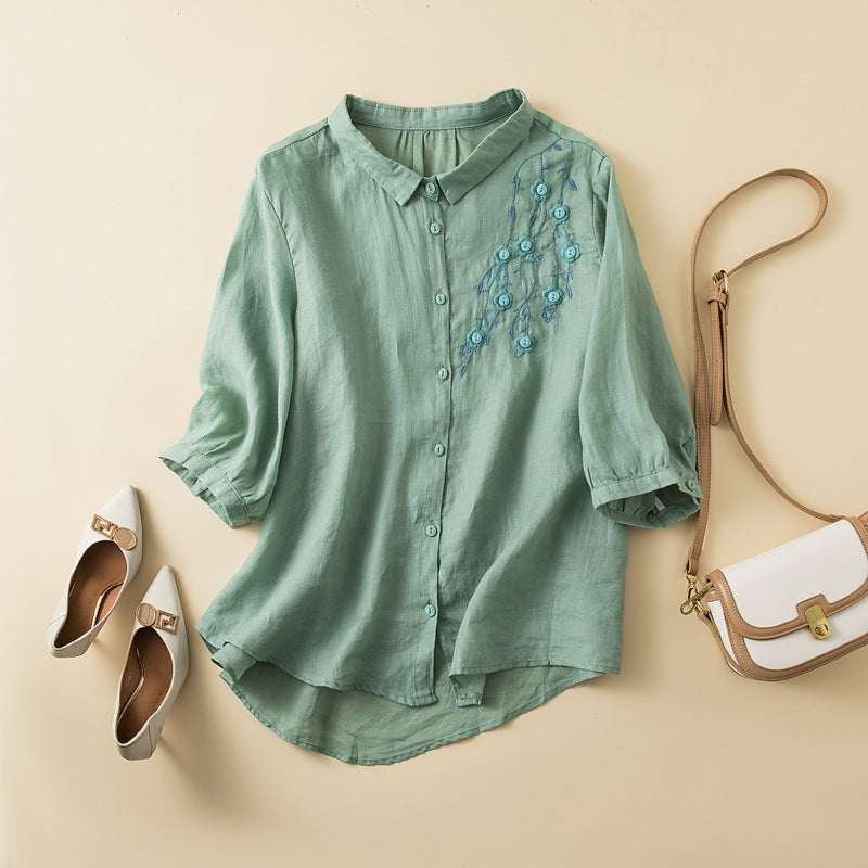 Women's relaxed-fit natural fiber shirt with mid-length sleeves and embroidered chest detail