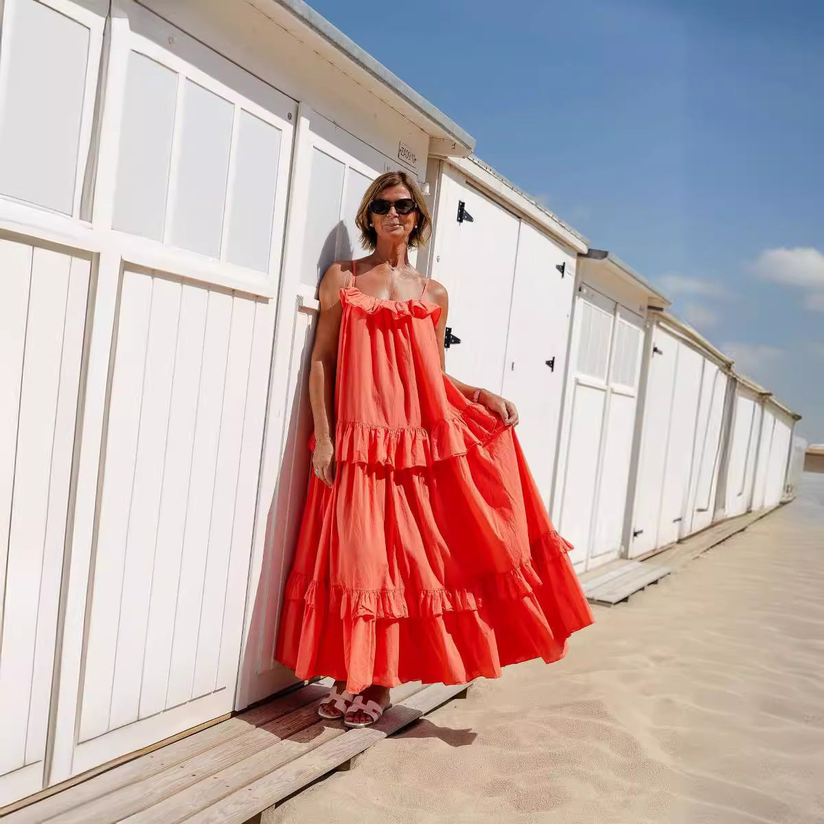 Flowy women's maxi dress in cotton blend with ruffle neckline and tiered skirt silhouette