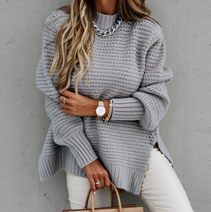 Jade green chunky knit oversized sweater with high neck and ribbed cuffs