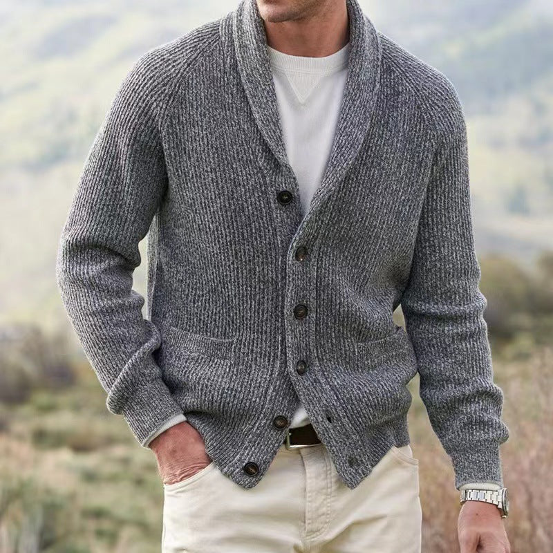 Men's shawl collar cardigan knit sweater with button closure, long sleeves, and front pockets