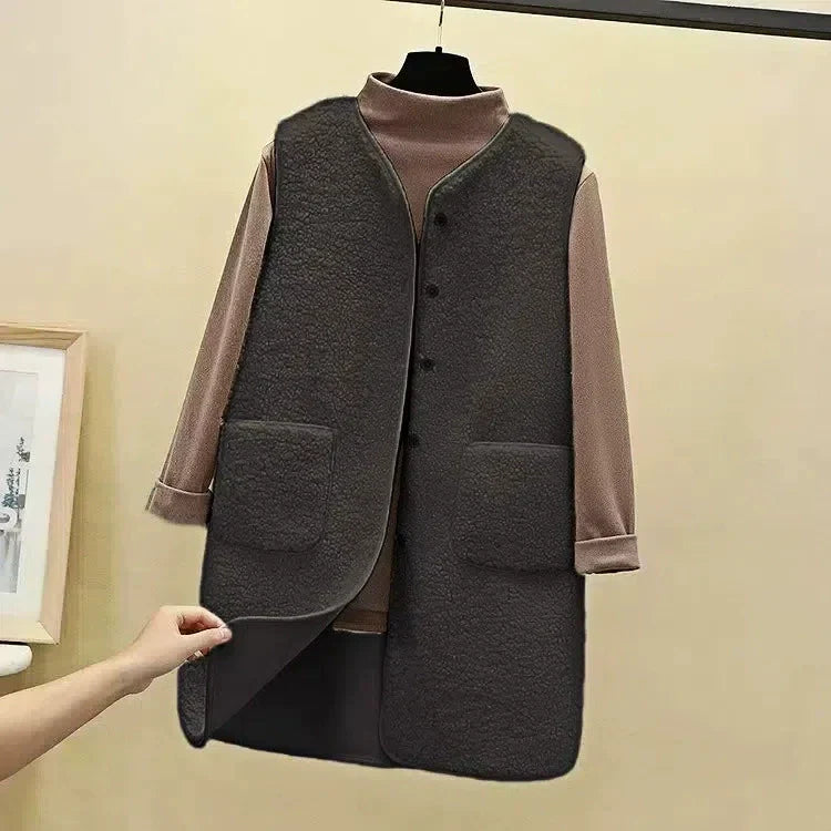 Women's longline plush fleece vest, relaxed fit, open front with patch pockets, cozy casual layer