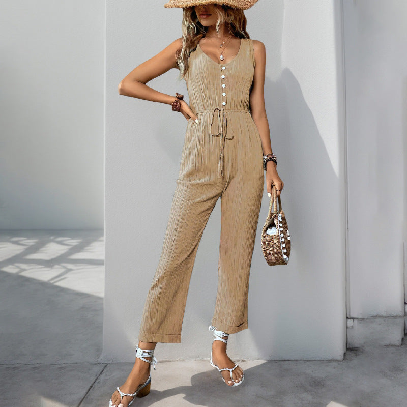 Women's beige textured sleeveless V-neck jumpsuit, relaxed fit with waist belt