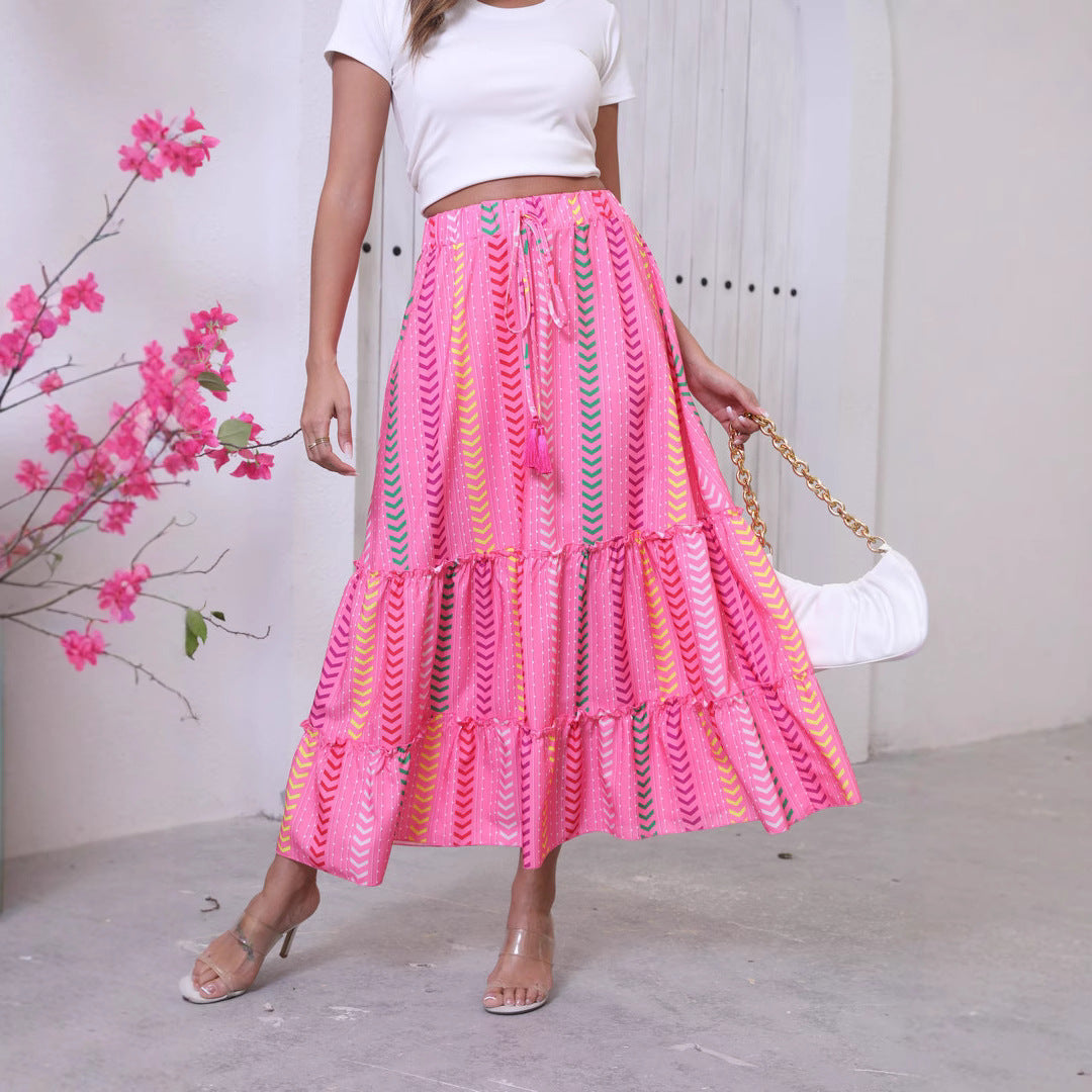 Women's high waist tiered boho maxi skirt in cotton feel fabric with fringe waist detail