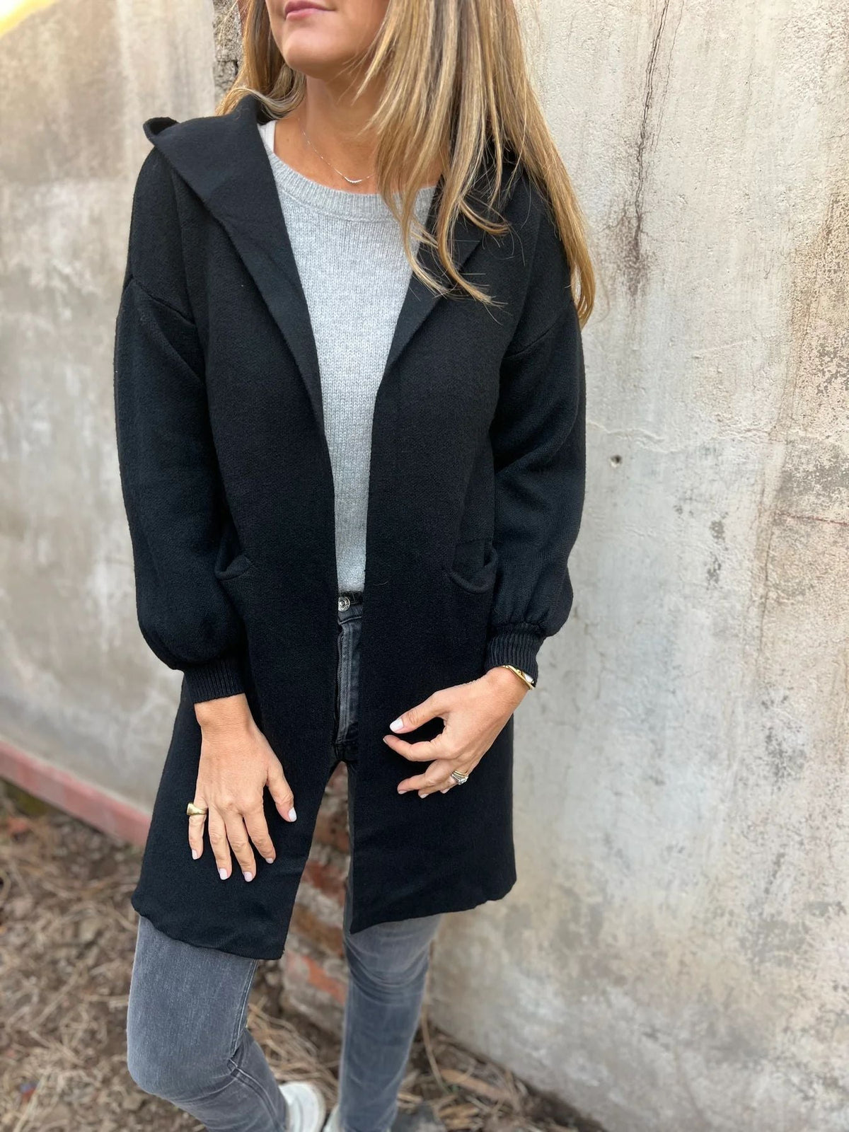 Beige hooded knit cardigan open-front relaxed fit with ribbed cuffs for effortless layering