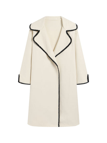 Women's oversized wool windbreaker jacket with lapel collar and delicate shell embroidery detail
