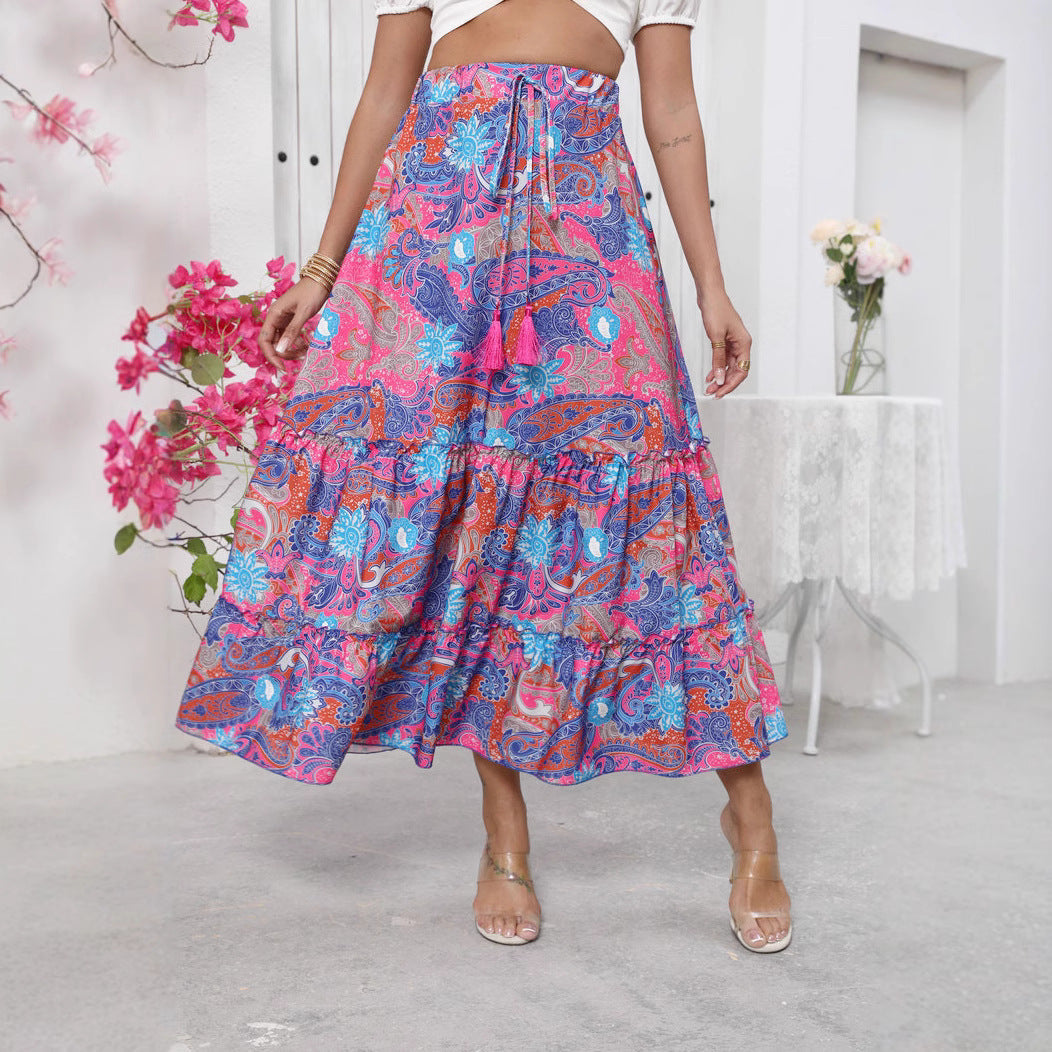 Women's high waist tiered boho maxi skirt in cotton feel fabric with fringe waist detail
