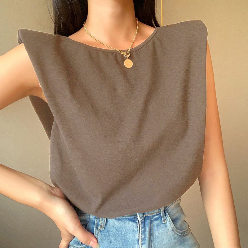 White relaxed-fit short sleeve top with extended shoulders in lightweight cotton blend