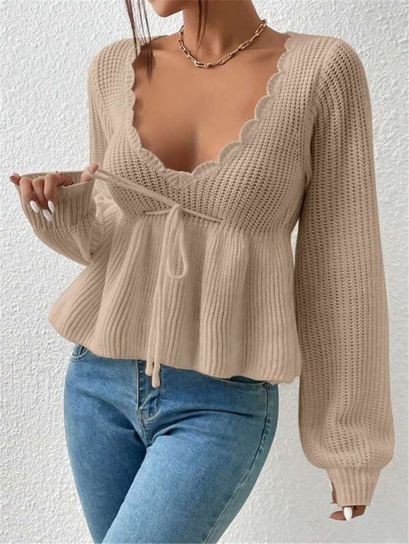 Women's ribbed knit pullover sweater, relaxed fit with drawstring waist and ruffled hem