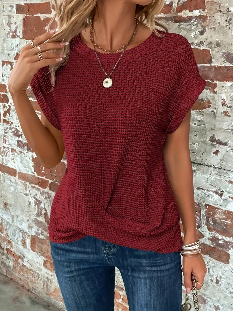 Women's waffle knit casual tee with rolled sleeves and front twist detail in relaxed fit