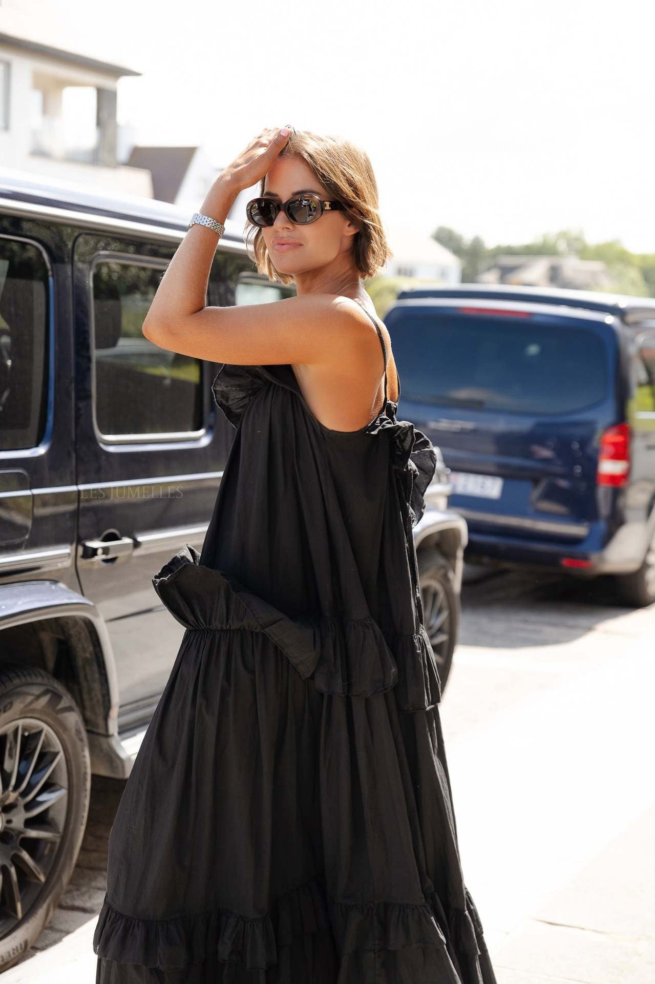 Flowy women's maxi dress in cotton blend with ruffle neckline and tiered skirt panels