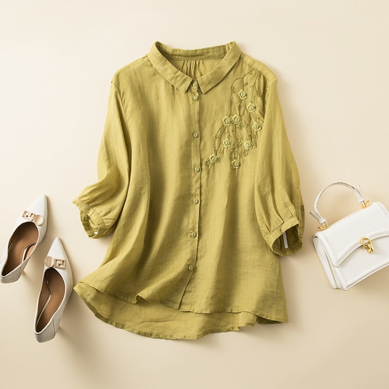 Women's relaxed fit natural fiber shirt with embroidered chest detail and medium-length sleeves