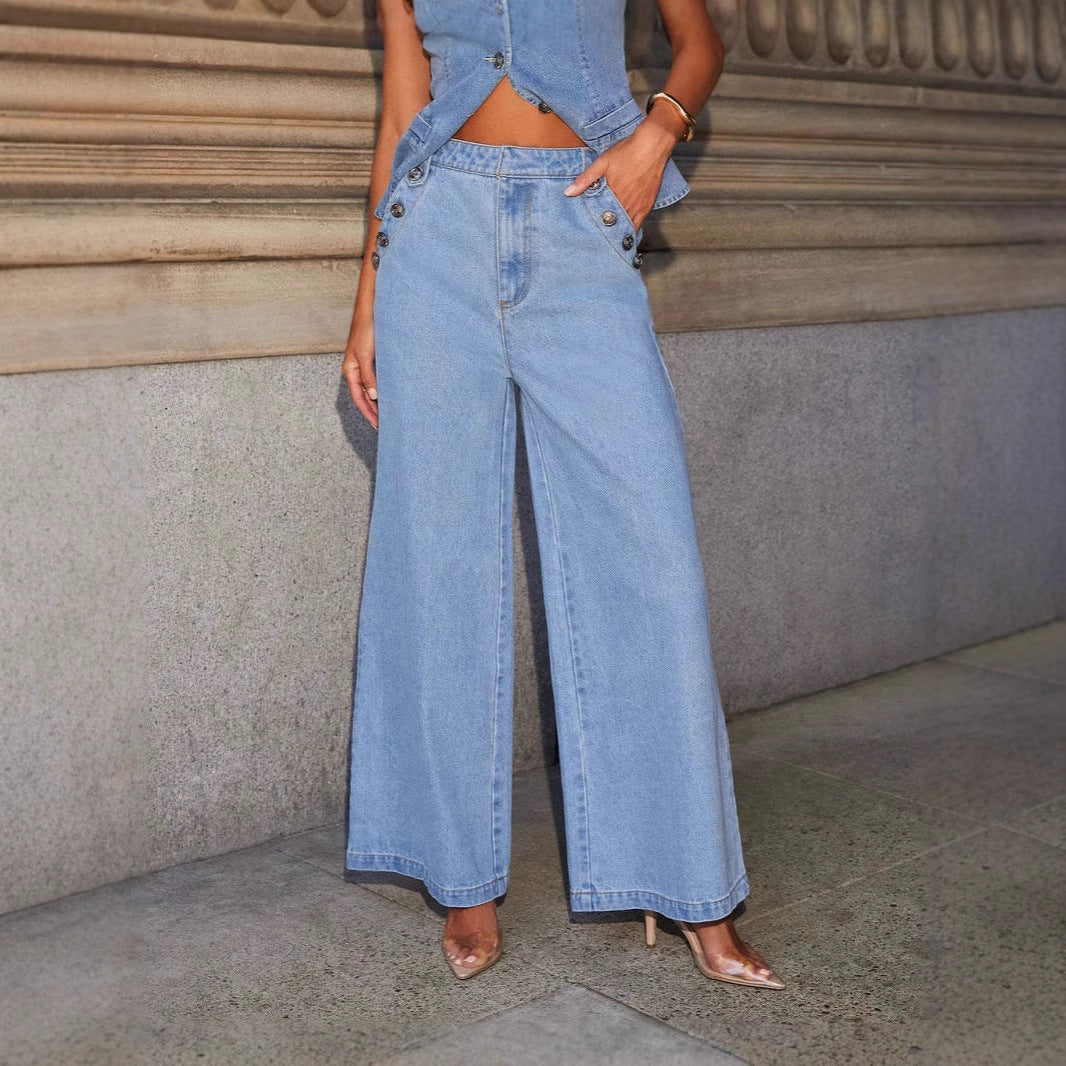 Women's blue denim vest tailored fit waist-length with button closure for a sleek layered look