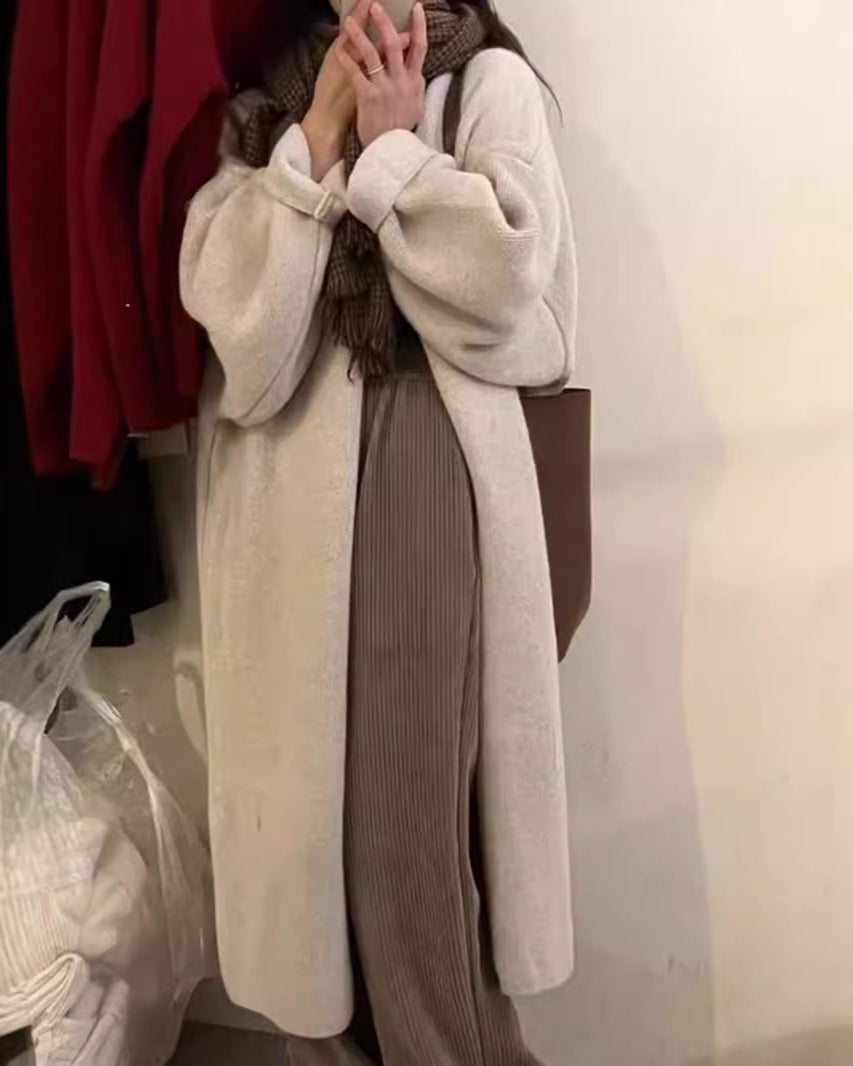 Women's oversized full-length wool knit cardigan coat with draped open front in neutral tone