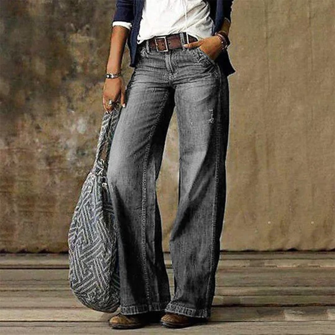 Women's high-waisted wide-leg jeans in classic blue denim with flattering natural waist silhouette