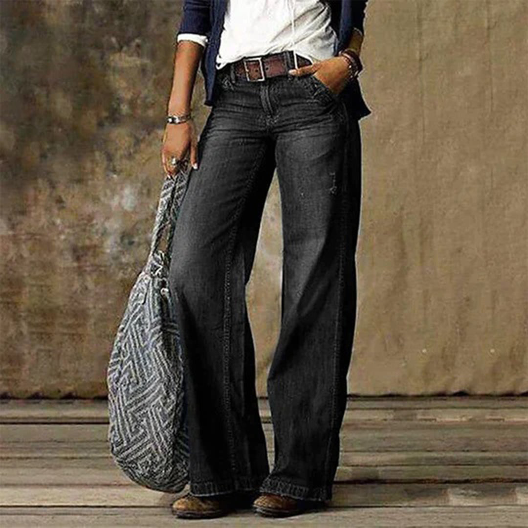 Women's high-waisted wide-leg jeans in classic denim blue with flattering natural waist silhouette