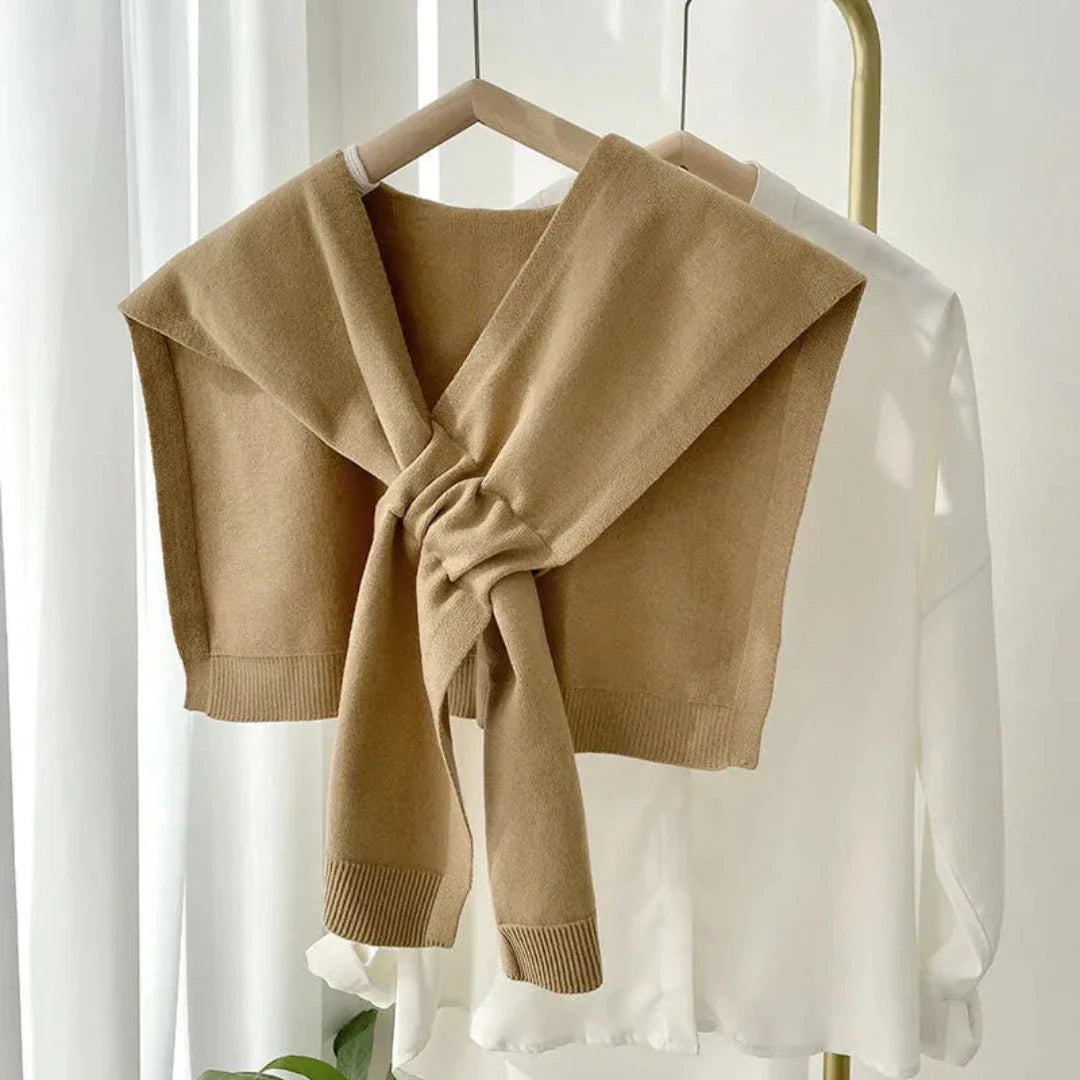 Ivory preppy knit shawl with tie-front draped design, soft stretch fabric layering piece
