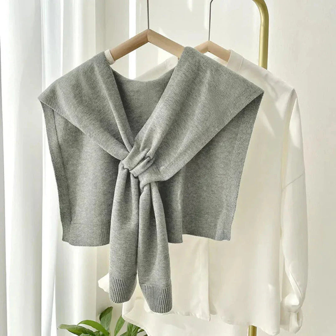 Olga preppy ivory knit shawl with elegant tie-front draped design for versatile layering