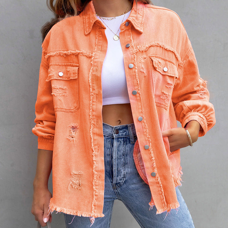 Distressed denim jacket relaxed silhouette frayed hem vintage-inspired finish for bold effortless style