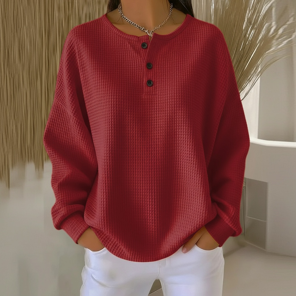 Cozy waffle-knit relaxed-fit sweater in neutral tones with textured pattern for effortless casual-chic style