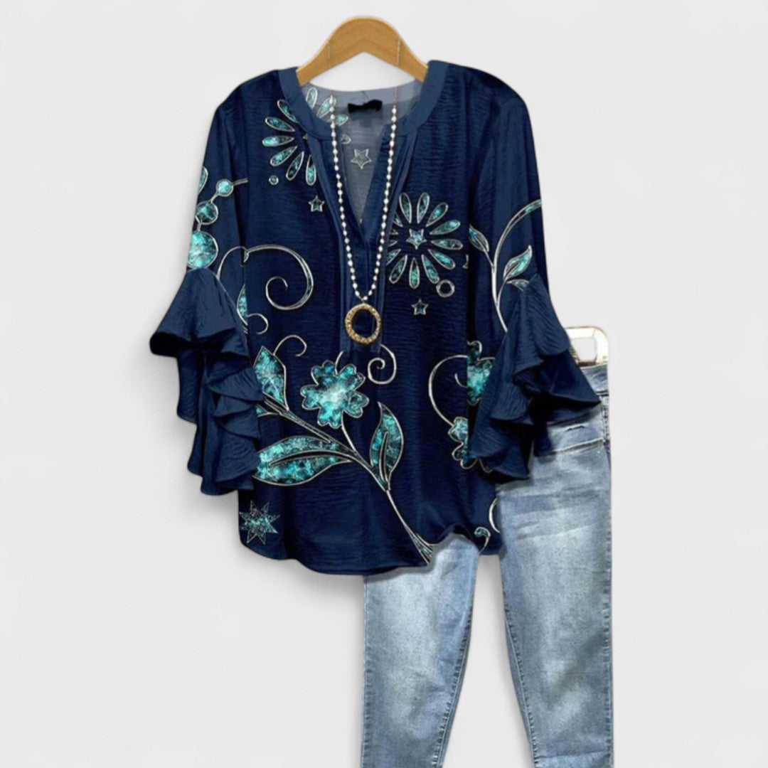 Lightweight day blouse in soft hues with feminine detailing, airy fit, and effortless everyday style