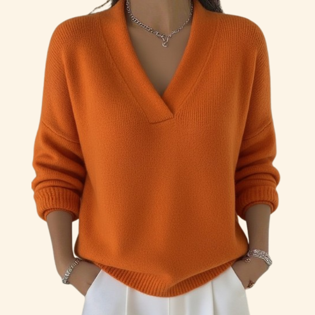Soft V-neck blouse with lightweight drape, breathable fabric, and flattering silhouette for effortless elegance