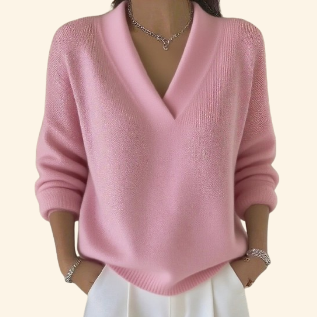 Soft V-neck blouse with lightweight drape, breathable fabric, and flattering silhouette for effortless chic style
