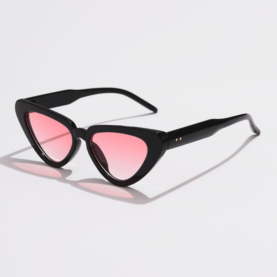 Black cat-eye sunglasses with sharp-edged frames, retro-modern silhouette and UV400 protection