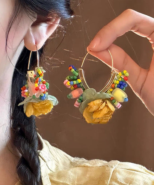 Boucles d'oreilles créoles florales en perles de tulle dorées et cuivrées au design original - Wavlynn