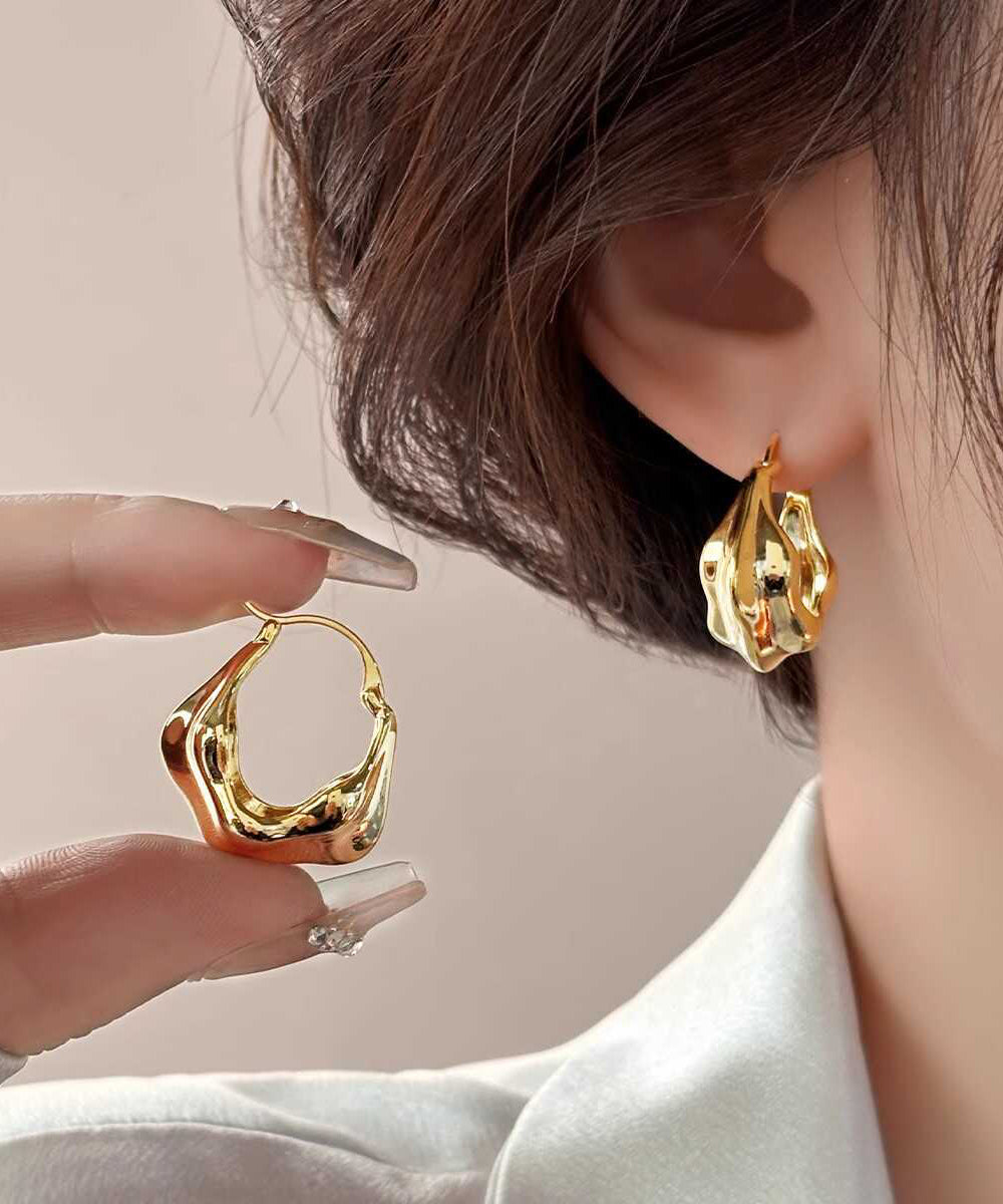 Boucles d'oreilles créoles en métal doré au design original - Wavlynn