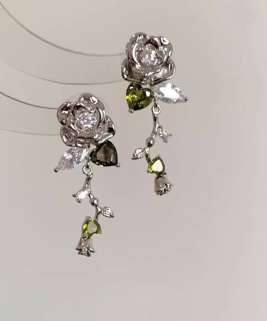 Boucles d'oreilles à tige en soie et métal avec zircon rose au design original - Wavlynn
