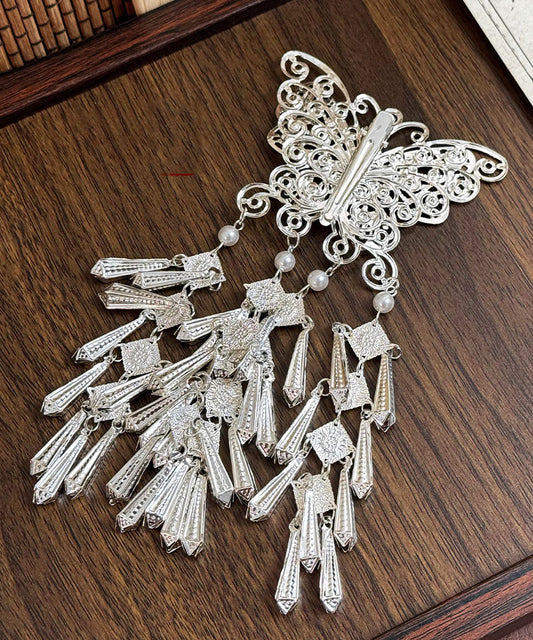 Épingle à cheveux papillon à pompon en soie, argent sterling et perle, design original - Wavlynn