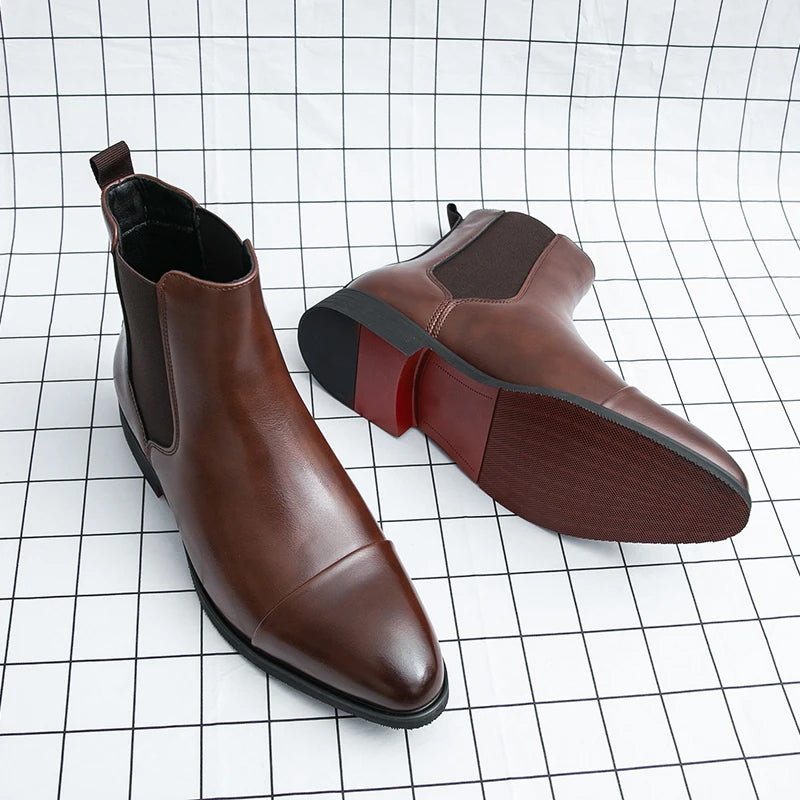 Black high-gloss leather Chelsea boots slip-on style with signature red rubber sole