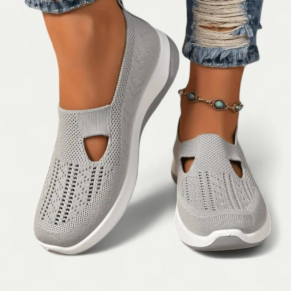 Women's gray slip-on knit mesh sneakers with breathable design and cushioned comfort