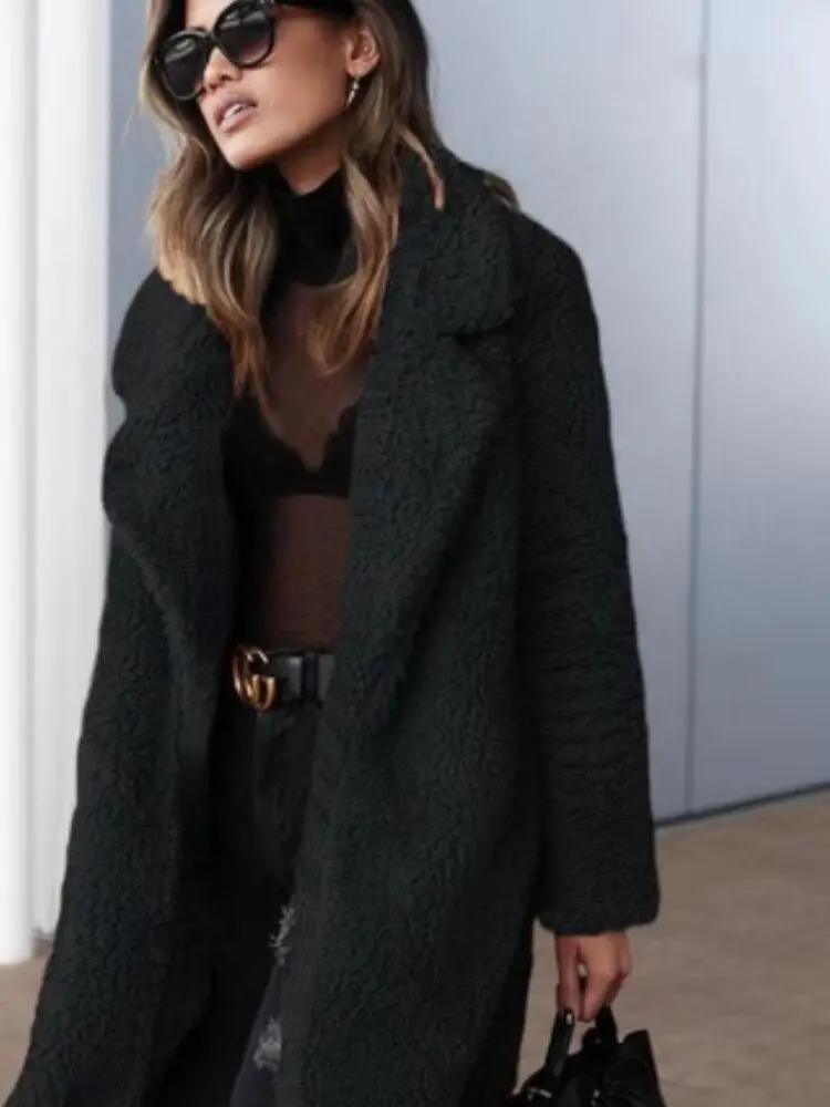 Women's oversized teddy coat in plush texture with lapel collar, long silhouette for cozy casual style