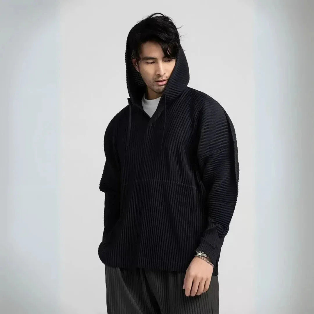 Palmer loose-fit pleated hoodie in relaxed silhouette with adjustable drawstring hood and textured pleats