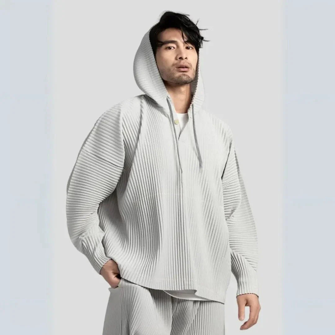 Palmer loose-fit pleated hoodie in neutral tone with adjustable drawstring and textured pleat detail
