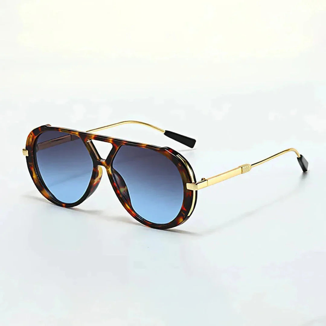Oversized retro aviator sunglasses with gradient lenses, gold-tone metal arms, and acetate rims