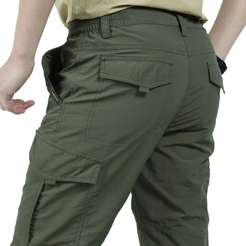 Men's slim fit cargo pants with multiple pockets, modern silhouette for everyday utility and comfort