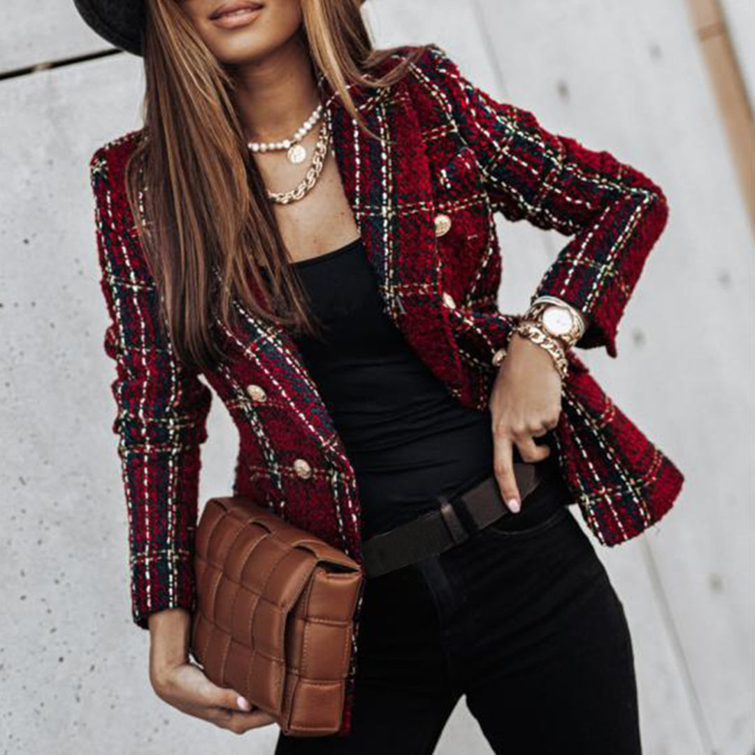 Women's classic tailored tweed blazer with rich texture and elegant gold button closure
